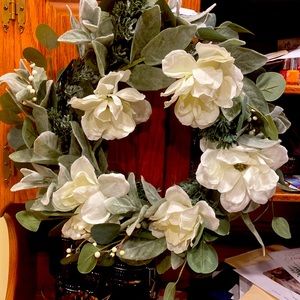 Beautiful white flowers on a eucalyptus wreath